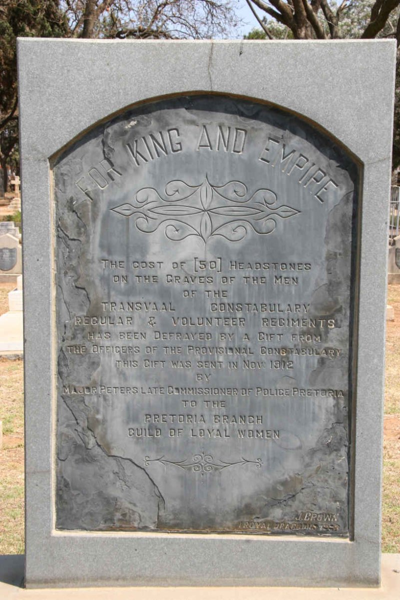 Plaque at the 50 graves